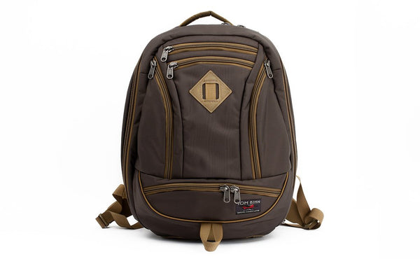 A face shot of the Guide's Edition Synik 22 in Ursa (brown-grey) 525 Ballistic.